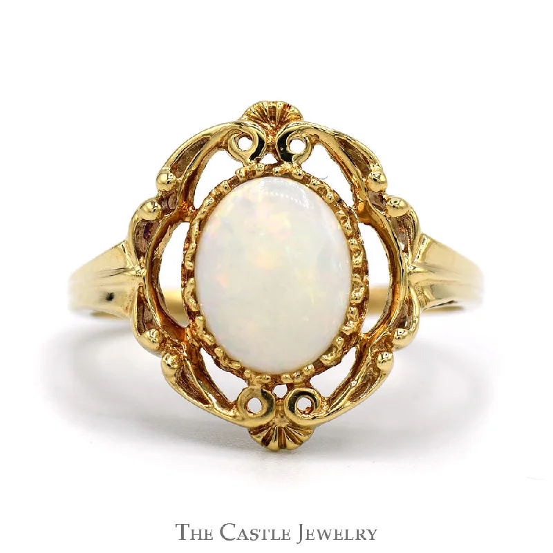 ladies rings with rainbow gems -Oval Cut Opal Ring in 10k Yellow Gold Open Antique Style Mounting