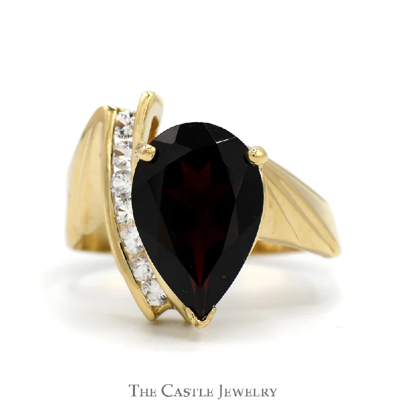 ladies rings with gemstone -Pear Cut Garnet Ring with White Sapphire Accents in 10k Yellow Gold Bypass Mounting