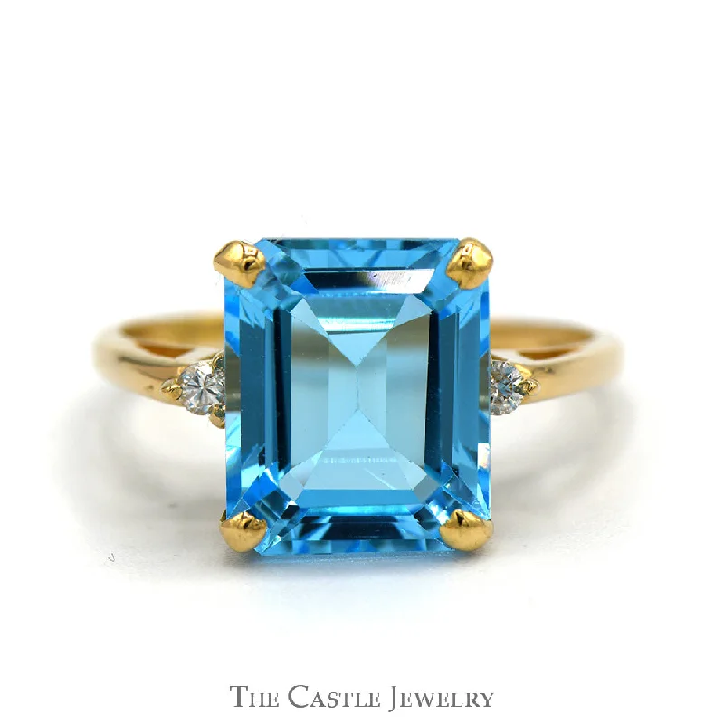 ladies rings hypoallergenic metal -Emerald Cut Blue Topaz Ring with Round Diamond Accented Sides in 14k Yellow Gold