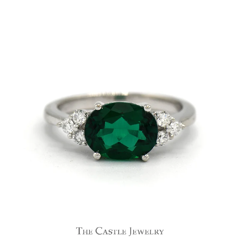 ladies rings layered style -Side Set Oval Cut Lab Created Emerald Ring with Diamond Accents in 14k White Gold