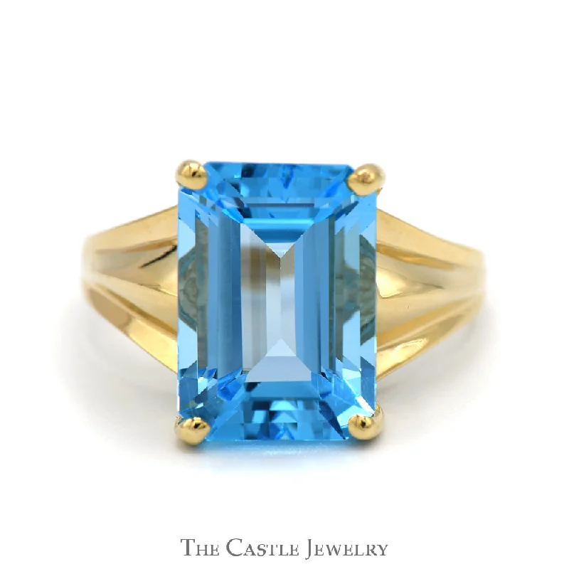 ladies rings with moonstone -Emerald Cut Blue Topaz Ring with Polished Tapered Sides in 10k Yellow Gold